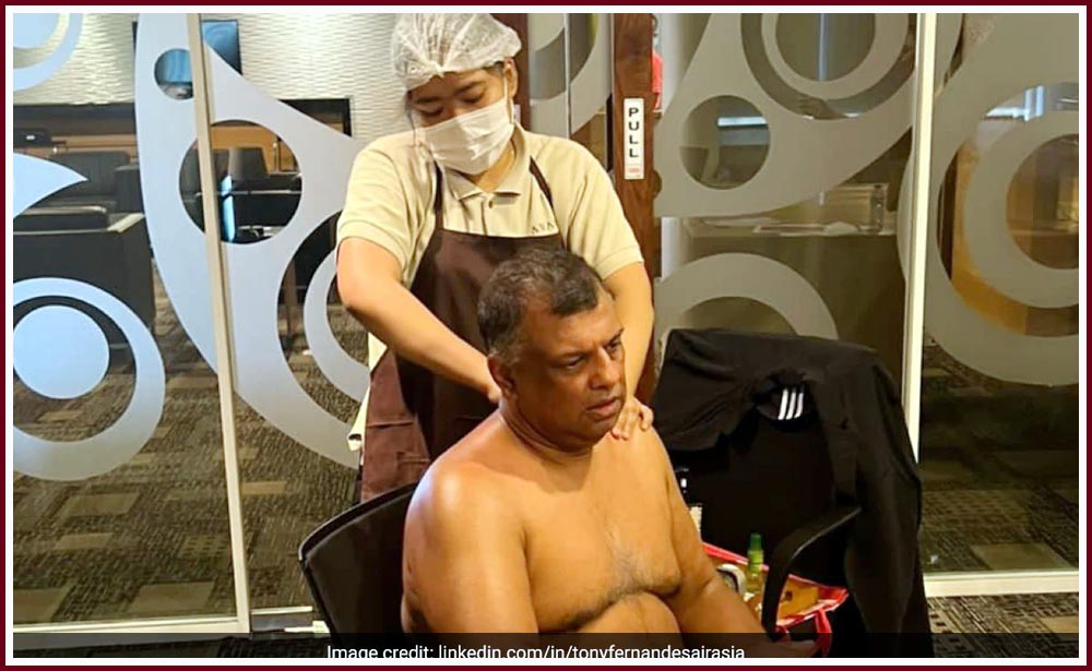 Airasia-ceo-sits-shirtless